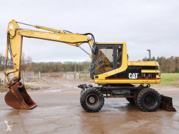 Excavadora excavadora de ruedas Caterpillar M312 - Good Working Condition / CE Certified