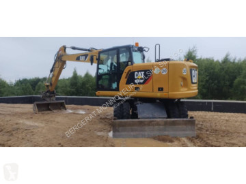 Pelle sur pneus Caterpillar