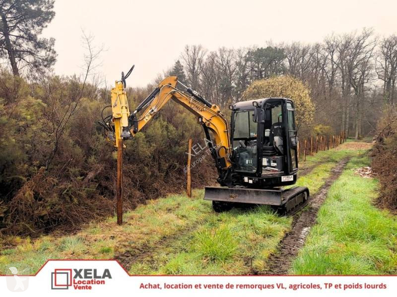 Skovl Sany LOCATION Pelle avec enfonce pieux ou...