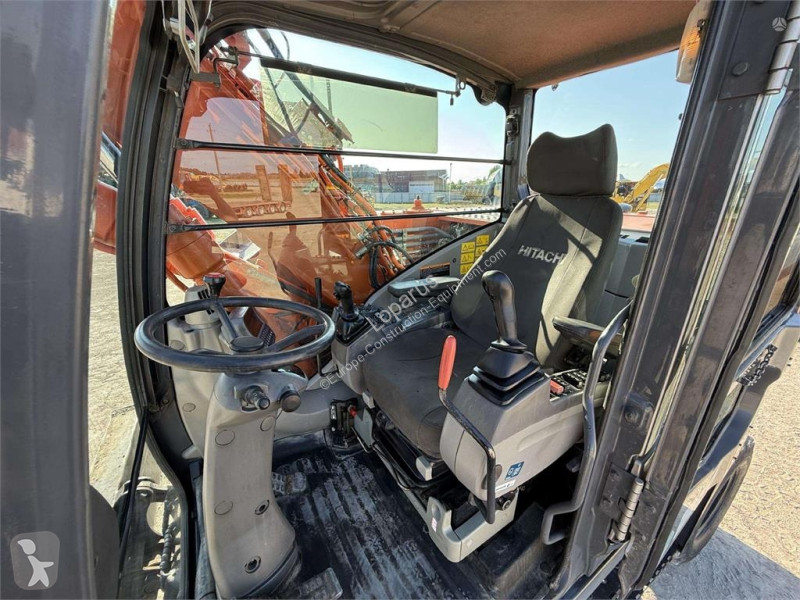Escavadora Hitachi 140 W