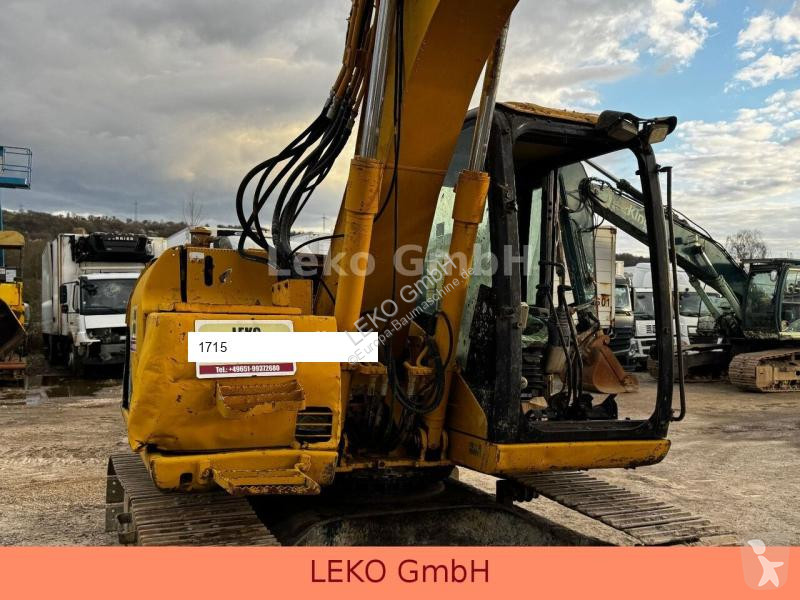 Lopatový nakládač Caterpillar 311C Mit Zwei...