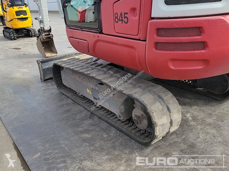 Escavadora Takeuchi 0