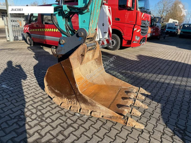 Excavadora Kobelco SK210 NLC-10 OQ70 180 Grad...