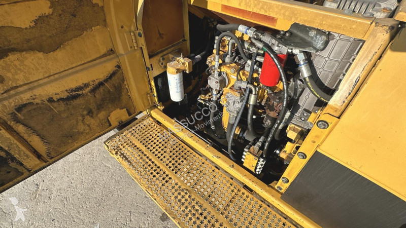 Rýpadlo Caterpillar M 4X4