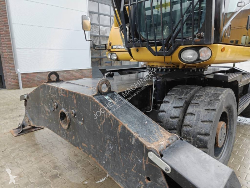 Escavatore Caterpillar M 318 D MH + GRAB