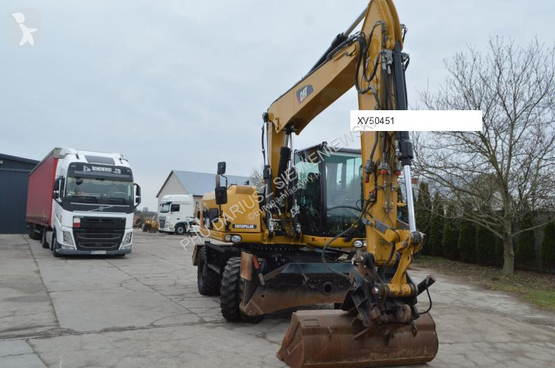 Lopatový nakládač Caterpillar 313
