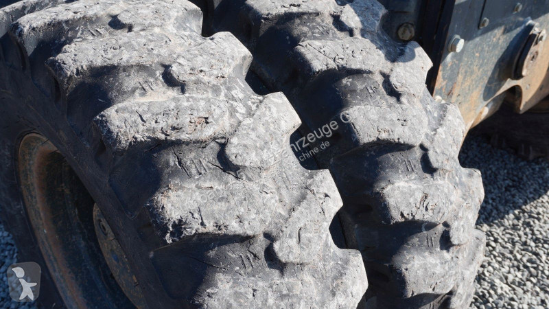 جرافة Komatsu Mobilbagger Verstellausleger HS21