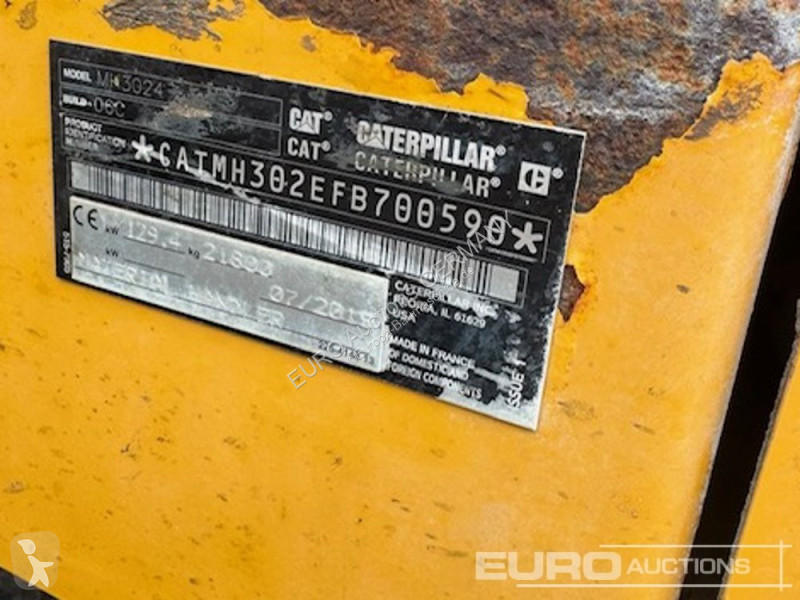 Багер Caterpillar MH3024