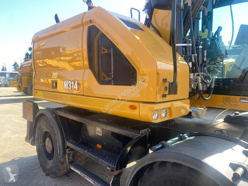 جرافة Caterpillar 07B next gen