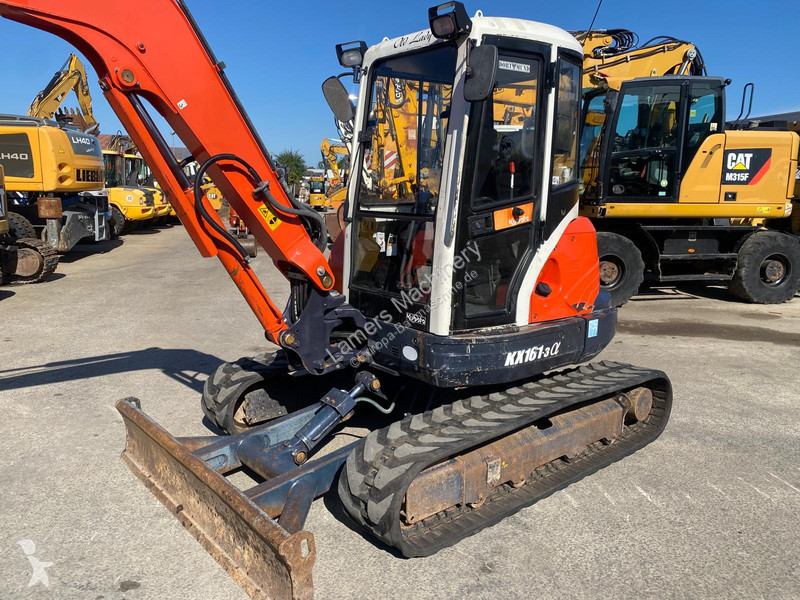 Багер Kubota 1613