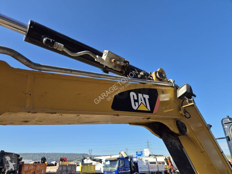Pelle Caterpillar E2