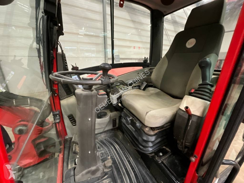 Багер Neuson EW 65