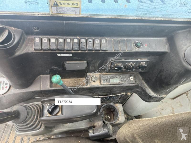 جرافة Takeuchi Powertilt