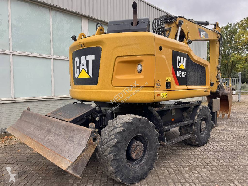 Багер Caterpillar F 2017