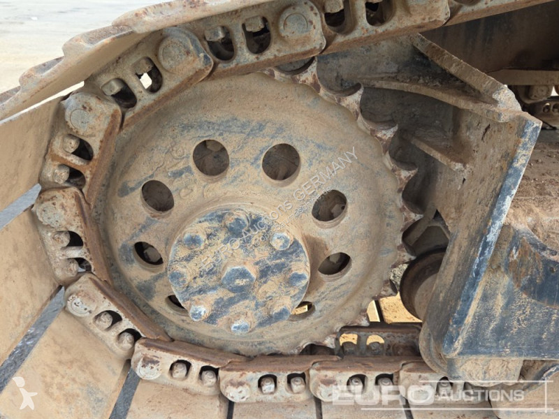 Багер Caterpillar 215C