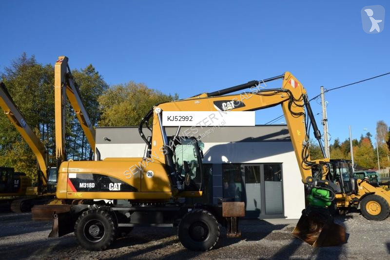 Graafmachine Caterpillar ROTOTILT