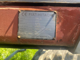 查看照片 Fiat-HitachiFH 130 W.3挖掘机