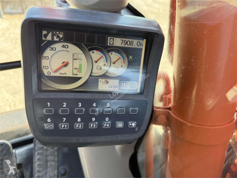 Escavadora Hitachi 140 W