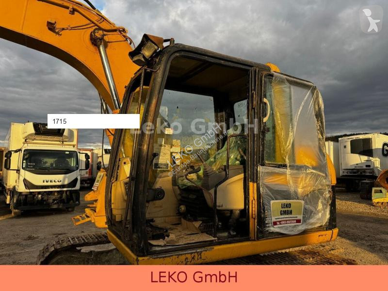 Lopatový nakládač Caterpillar 311C Mit Zwei...