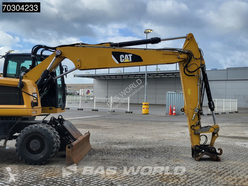 جرافة Caterpillar F F Outrigger + Blade
