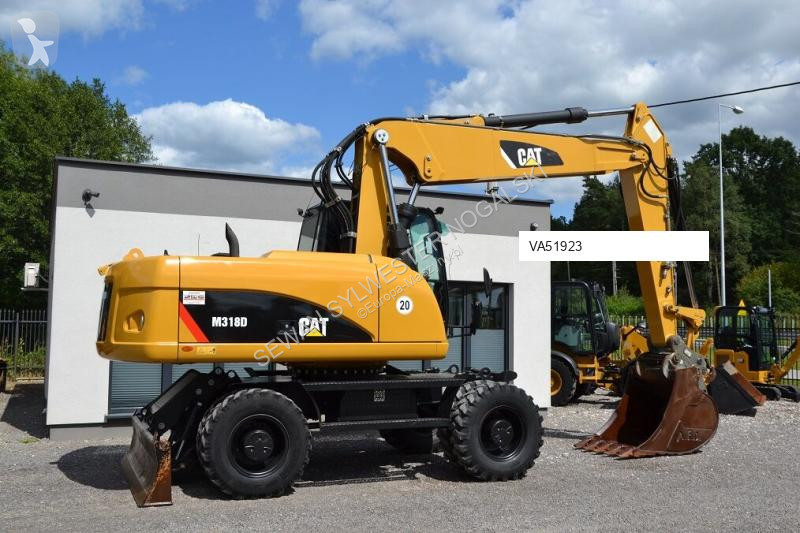 Lopatový nakládač Caterpillar 318 D