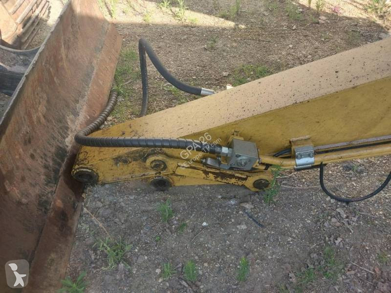 Екскаватор Caterpillar
