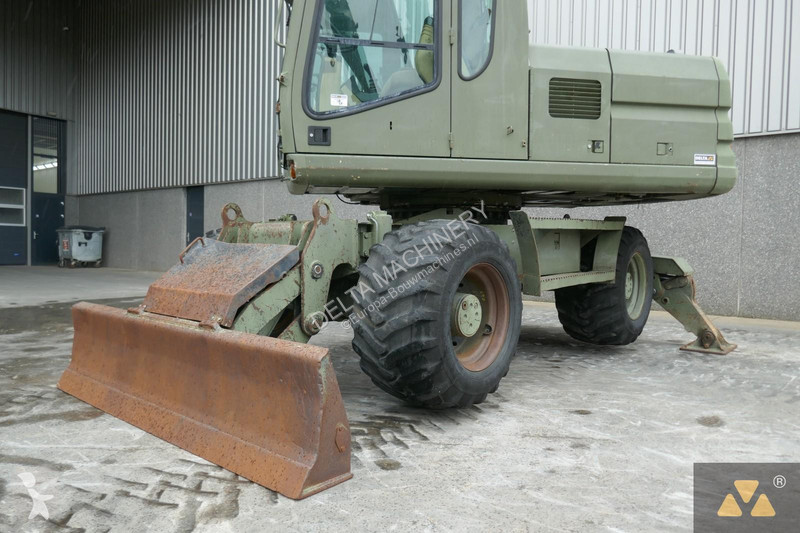 Koparka Caterpillar Ex-army