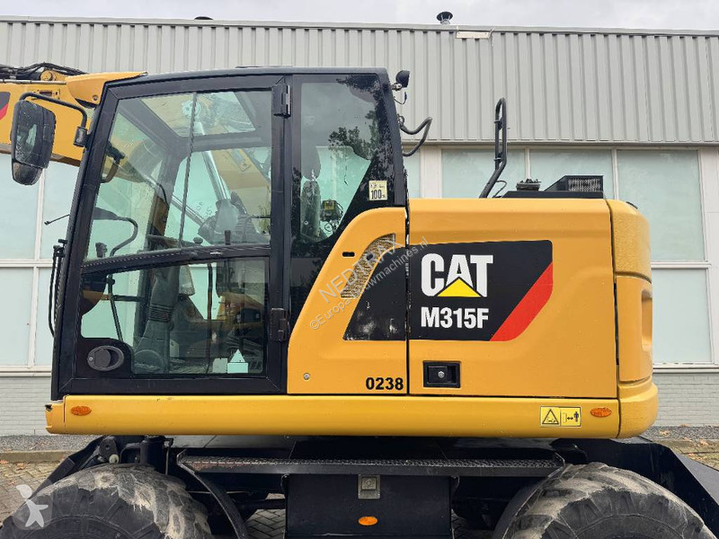 Багер Caterpillar F 2017