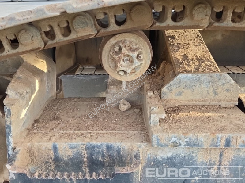 Багер Caterpillar 215C
