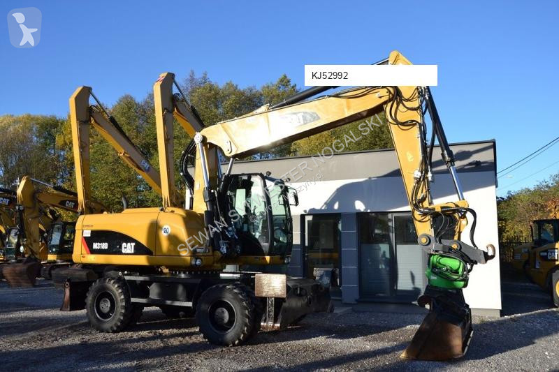 Graafmachine Caterpillar ROTOTILT
