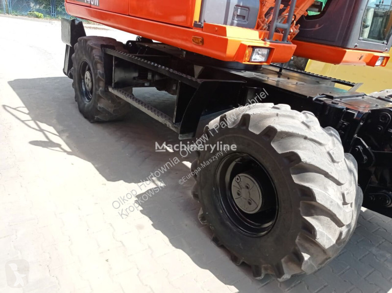 Lopatový nakládač Doosan DX140 W-3 Z SYSTEMEM...