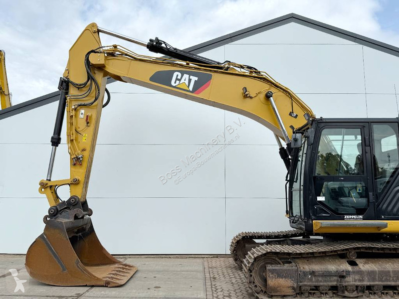 Escavadora Caterpillar - German Machine / Rear...