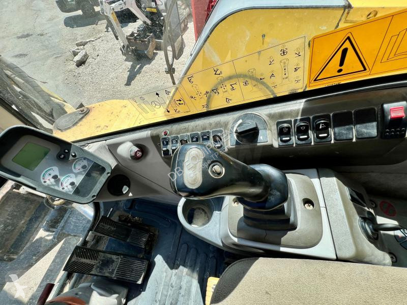 Excavator New Holland PELLE A PNEUS 10T 26