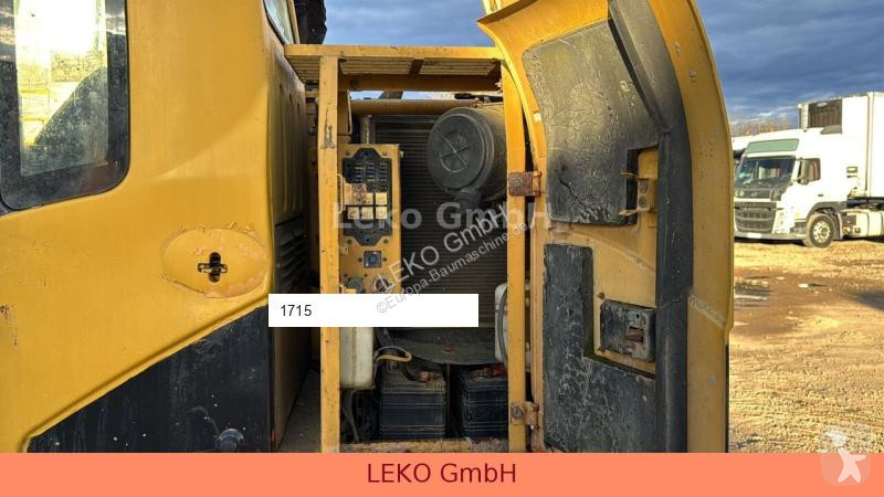 Lopatový nakládač Caterpillar 311C Mit Zwei...