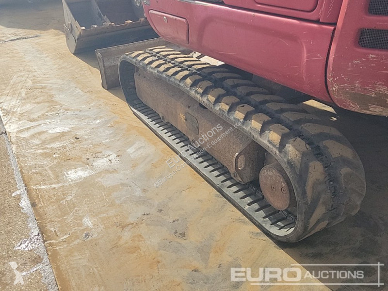 Escavadora Takeuchi 0