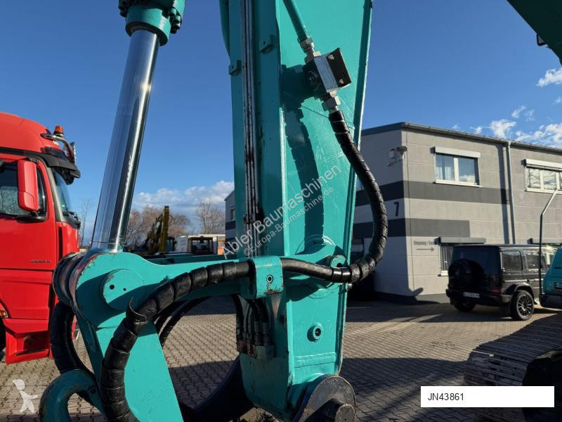 Excavadora Kobelco SK210 NLC-10 OQ70 180 Grad...