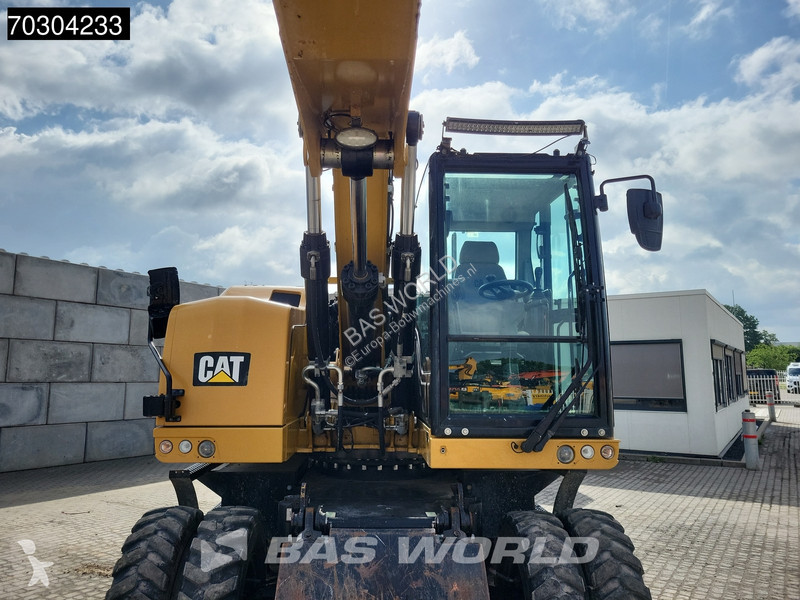 جرافة Caterpillar F F Outrigger + Blade