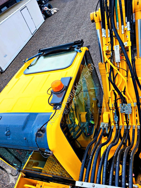 Lopatový nakládač Komatsu - 8 A/C 3 ARMS