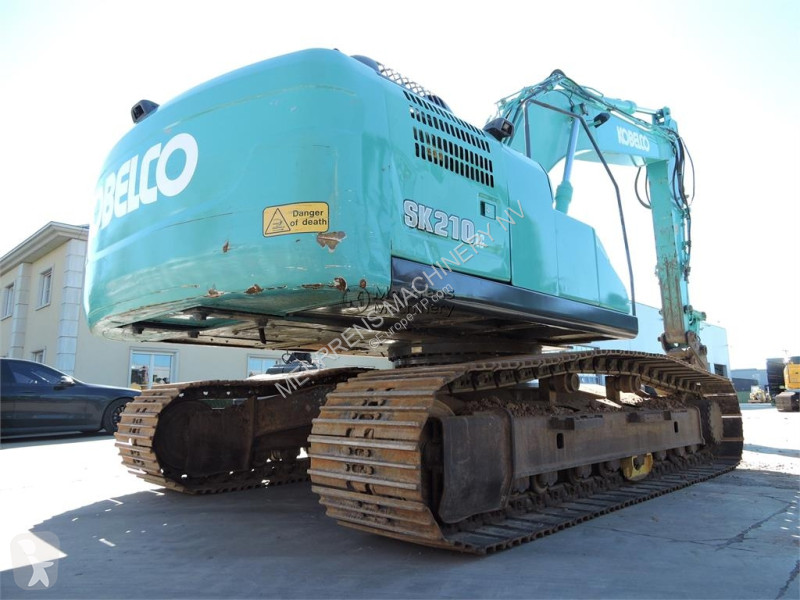 جرافة Kobelco SK210