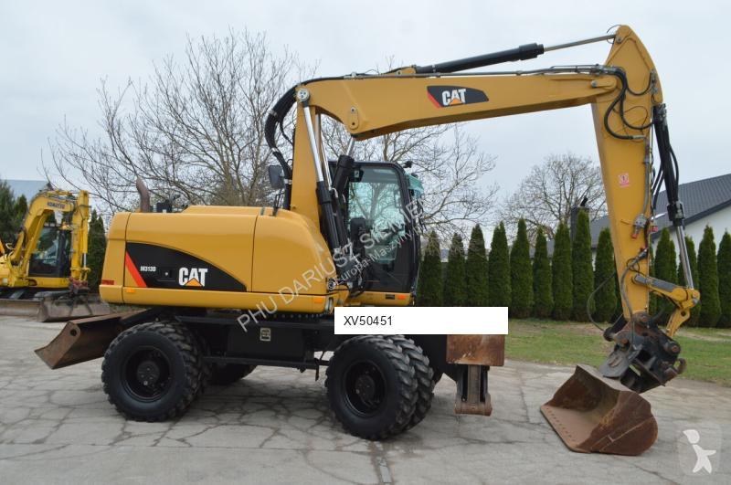 Lopatový nakládač Caterpillar 313