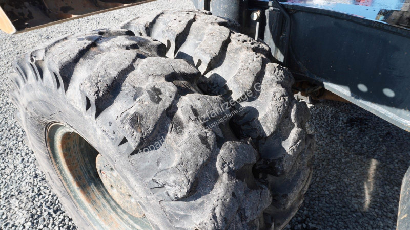 جرافة Komatsu Mobilbagger Verstellausleger HS21