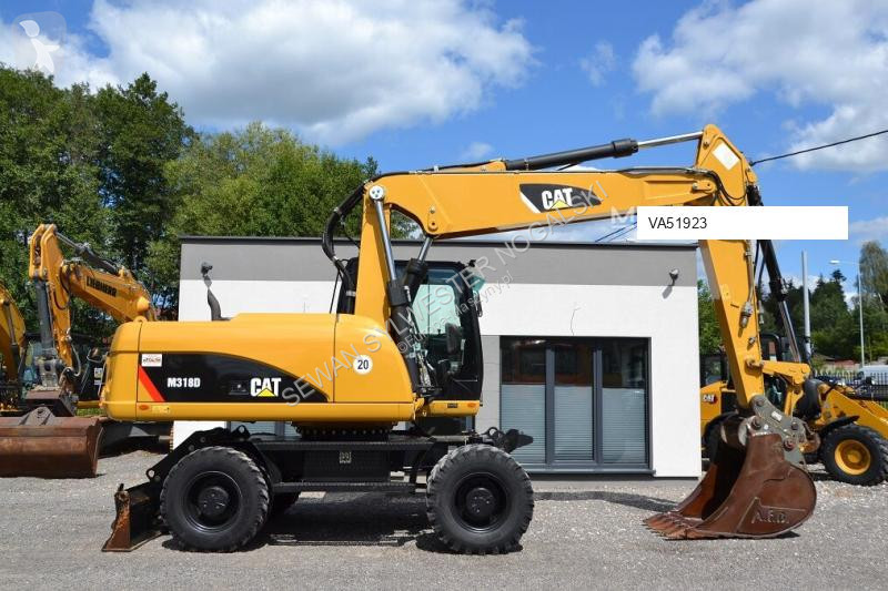 Lopatový nakládač Caterpillar 318 D