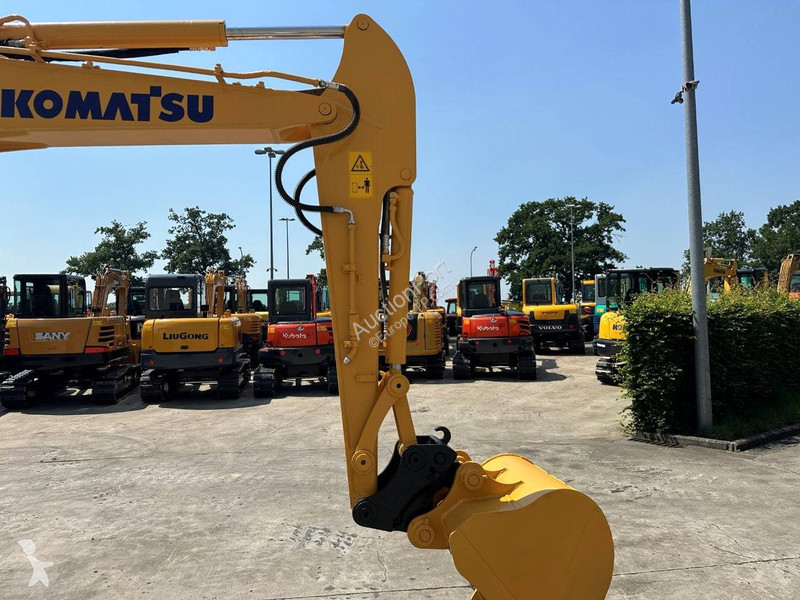 Екскаватор Komatsu 7