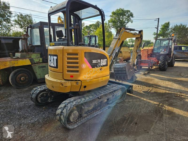 Екскаватор Caterpillar