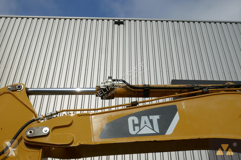 Багер Caterpillar LME