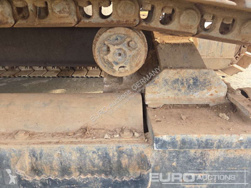 Багер Caterpillar 215C