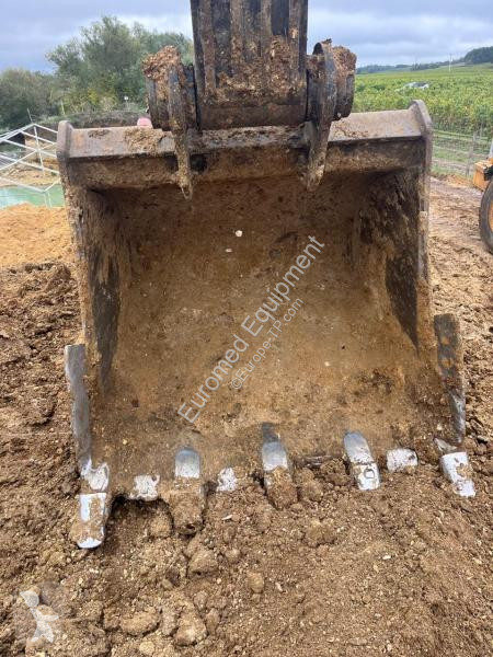 Escavadora Case