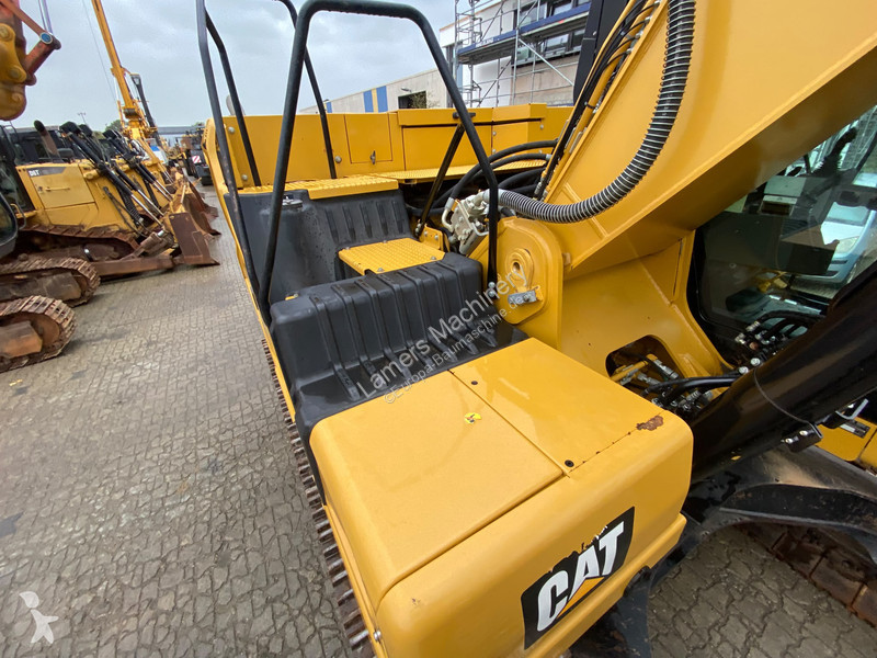 Graafmachine Caterpillar NG .