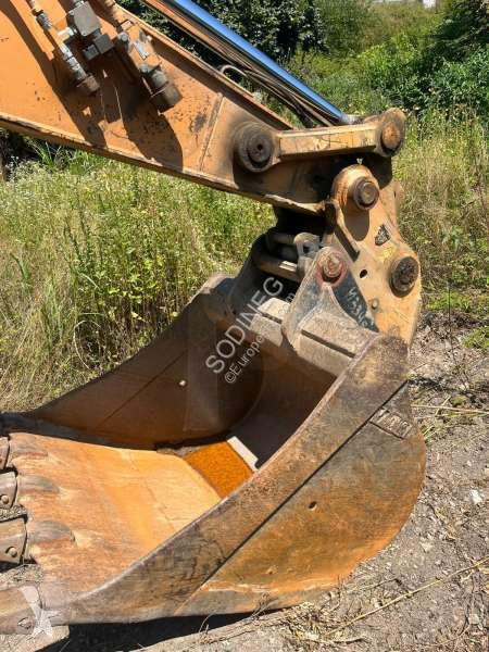 Escavadora Case