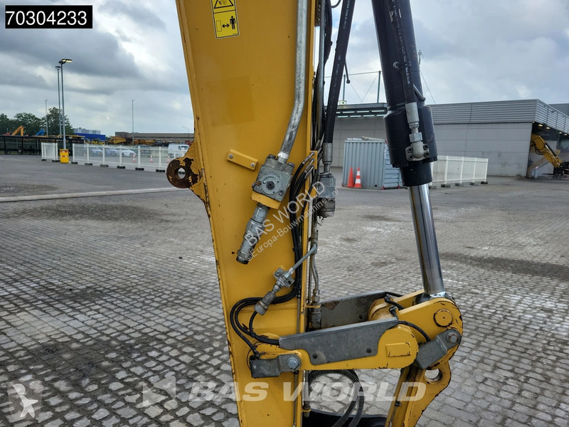 جرافة Caterpillar F F Outrigger + Blade